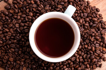 Cup of coffee with Coffee beans, closeup