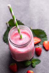 Glass of fresh strawberry shake smoothie. strawberry smoothie with fresh strawberries