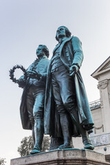 Statue of famous german writers Goethe and Schiller in Weimar, Germany