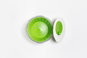 Centrifugal dryer for salad on white background. Mechanical dryer for greens. Plastic Vegetable...