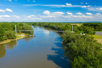 Aerial view of a footbridge on the Drava River in Kriznica, Croatia