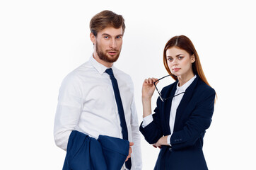 man and woman in suits working office professional