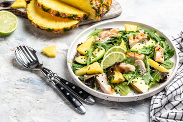 Grilled chicken breast, pineapple, avocado, green rocket salad, lime and olive oil. selection of healthy food