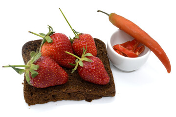 bread with strawberries and hot chili peppers
