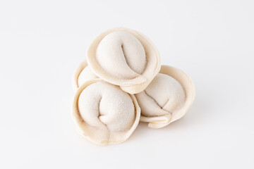 frozen dumplings on white background