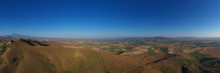 180 degree saerial photo of the wheat fields in the heart of Sicily in the Erei mountains. Sicilian...