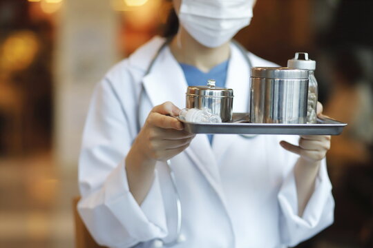 Cropped Image Of Doctor Holding Medical Tray