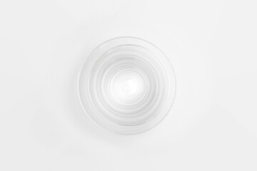 Fototapeta na wymiar Transparent plastic bowls of different sizes isolated on white background. High-resolution photo.