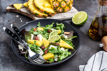 Vitamin salad of leaves of pineapple, blue cheese. almond, Healthy juicy food. Food recipe...