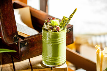 Matcha green tea frappe with red bean at cafe shop - obrazy, fototapety, plakaty
