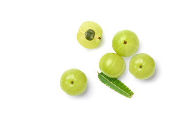 Flat lay of Fresh Amla (Indian gooseberry) fruits with leaf isolated on white background.