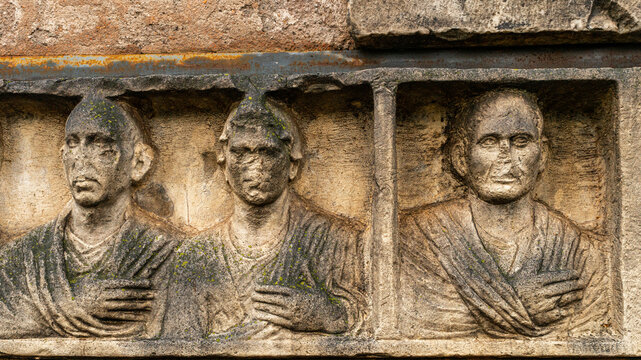 Roman tomb on the ancient Appia Antica road of the Roman Empire, illuminated by the rays of the sun near the Villa of Maxentius, the tomb of Cecilia Metella and the Catacombs, Rome Italy Europe.
