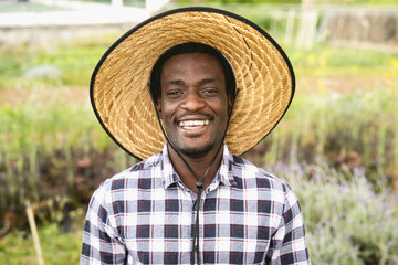 Happy African farmer working in farmhouse country - Farm people lifestyle concept