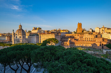 Fototapeta na wymiar Rome Panorama of the city from the terrace of the Altar of the Fatherland, monument to Vittorio Emanuele II. Piazza Venezia with the Mercati Traianei, the Torre delle Milizie church, Rome.