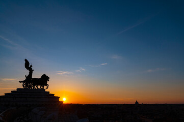 Fototapeta na wymiar The quadriga with the winged Victory from the terrace of the Vittoriano or Altare della Patria in Rome at sunset. National Monument to Vittorio Emanuele II, Capitoline Hill Rome, Italy, Europe.