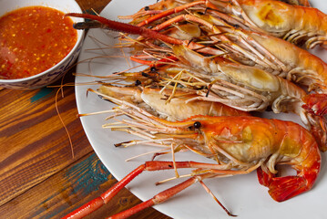 Roasted, Grilled Prawn on the Wood Table, Fresh Seafood shrimp Tasty Meal.