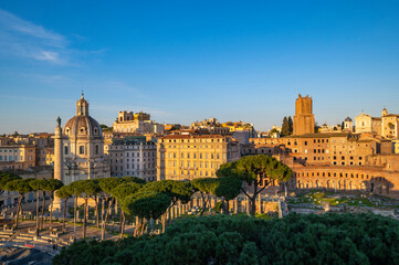 Fototapeta na wymiar Rome Panorama of the city from the terrace of the Altar of the Fatherland, monument to Vittorio Emanuele II. Piazza Venezia with the Mercati Traianei, the Torre delle Milizie church in Rome.