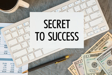 Fototapeta premium Secret To Success is written in a document on the office desk, keyboard and diagram