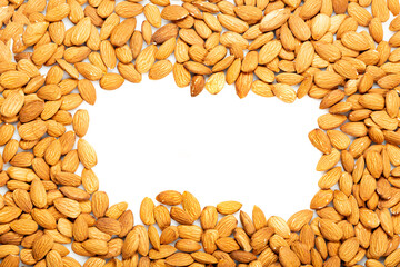 Close up. Frame. Dry  almonds.  Shelled almonds on a white background,