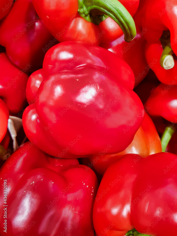 Canvas Prints Closeup of bright red yummy bell peppers with green