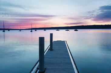 Fototapeta premium Stiller Sonnenaufgang am See
