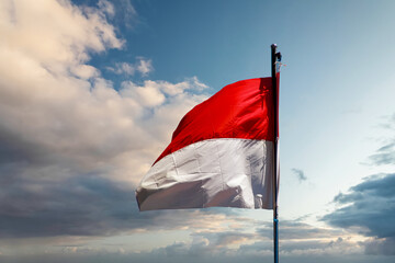 Indonesia flag against the sky background. independence day concept.