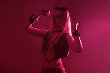 Disco style, young attractive woman in retro style outfit dancing - obrazy, fototapety, plakaty
