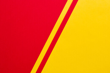 Diagonally divided red and yellow contrast background