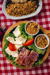 Pihtije i Duvan cvarci - traditional Balkan food. Dish in restarurant.