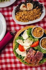 Pihtije i Duvan cvarci - traditional Balkan food. Dish in restarurant.