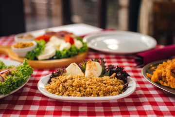 Pihtije i Duvan cvarci - traditional Balkan food. Dish in restarurant.