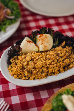 Pihtije i Duvan cvarci - traditional Balkan food. Dish in restarurant.