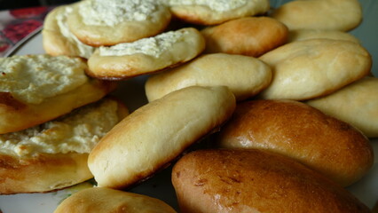 the platter contains pies stuffed with cabbage and cottage cheese 