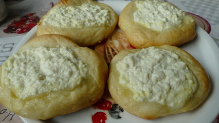 the platter contains pies stuffed with cabbage and cottage cheese 