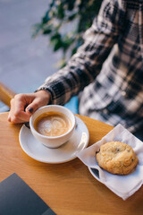 Espresso coffee holding girl in cafeteria
