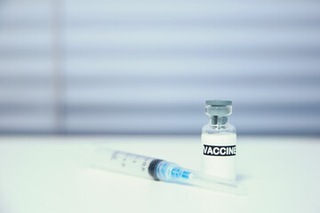 Vaccine vial dose flu shot drug needle syringe,medical concept, vaccination baby child