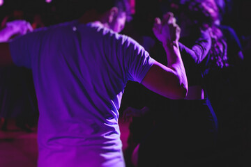 Couples dancing traditional latin argentinian dance milonga in the ballroom, tango salsa bachata...