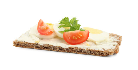 Fresh rye crispbread with boiled egg, cream cheese and tomato isolated on white