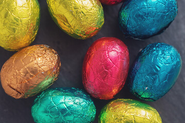 macro photography of multicolored chocolate eggs