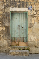 Traditional architecture and detail of wooden door in Sicily, Italy