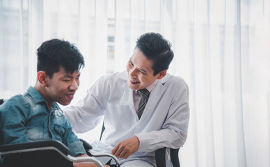 Doctors recommend caring for physically disabled patients, encouraging hands placed on shoulders,...