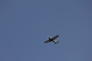 old plane on blue sky background 
