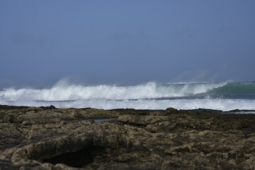 the waves of the sea demonstrate their power
