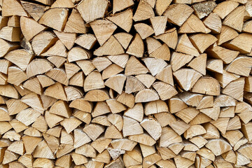 Chopped firewood background. Firewood preparation.