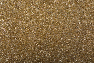 Beautiful shiny brass glitter as background, closeup