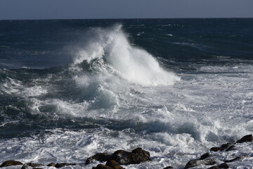 the waves of the sea demonstrate their power