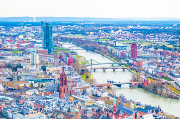 Fototapeta na wymiar Frankfurt urban scenery from above. River through city. 
