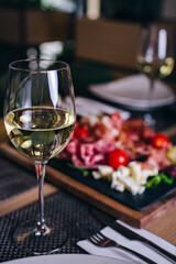 Appetizer closeup with wine on table