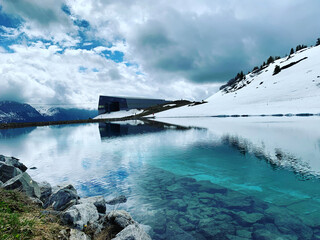 Mountain lake in spring, fills up with melting water