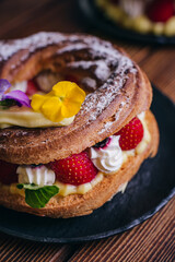 donut cookie filled with cream and strawberries